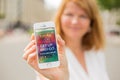 RIGA, LATVIA - July 14, 2016: Woman showing Pokemon Go website on the phone. Pokemon Go is a location-based augmented reality