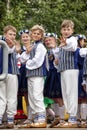 Dancers behind scene waiting for time to perform at the Grand Folk dance concert