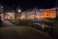 Riga, Latvia: Love padlocks as a symbol of eternal love and marriage fixed to metal railings on bridge in the Bastejkalna Park in Royalty Free Stock Photo