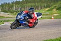 12-05-2020 Riga, Latvia. man on a motorbike on the road riding. having fun driving the empty road on a motorcycle tour journey Royalty Free Stock Photo