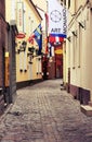 Evening, romantic street with hotels in old town of Riga.