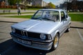 Riga, Latvia May 4 2021: 1979 BMW E21 316 light blue colour with gold rims Royalty Free Stock Photo