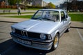 Riga, Latvia May 4 2021: 1979 BMW E21 316 light blue colour with gold rims