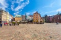 RIGA, LATVIA - MAY 06, 2017: View on the colored cozy old houses, churches and Dome Square with street cafes that are located i Royalty Free Stock Photo