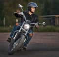25-05-2020 Riga, Latvia. Motorcyclist goes on road, front view, closeup Royalty Free Stock Photo
