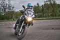 25-05-2020 Riga, Latvia. Motorcyclist goes on road, front view, closeup Royalty Free Stock Photo
