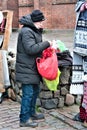 Riga, Latvia, November 2019. A local businessman is preparing for the trade in souvenirs.