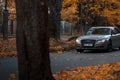 Riga, Latvia-October 6, 2021: Audi A8 driving on the city street during the beautiful autumn