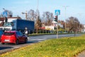 Cars stopped at a pedestrian crossing to allow a person to cross the street, traffic rules concept Royalty Free Stock Photo