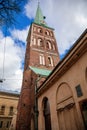 Riga, Latvia, 14 October 2021: St. James`s Cathedral, Lutheran and Orthodox Church with bell tower, Northern Gothic Style with Re Royalty Free Stock Photo