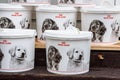 Plastic buckets of Royal Canin brand dog`s food