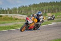 12-06-2020 Riga, Latvia. Racing bike rider leaning into a fast corner on track day Royalty Free Stock Photo