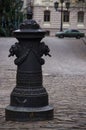 Riga, Latvia. Road pillar with lions heads at Torna street in old town