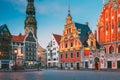 Riga, Latvia. Scenic Town Hall Square With St. Peter's Church, Schwabe House, House Of Blackheads. Popular Showplace