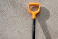 Digging spade at the wall of house from Fiskars collection