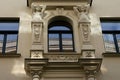 Riga, Latvia, September, 17, 2019: Window with caryatids instead of columns in art nouveau style building in the centerof old town