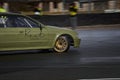 10-04-2022 Riga, Latvia Sport car wheel drifting. Blurred of image diffusion race drift car with lots of smoke from