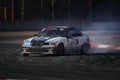 10-04-2022 Riga, Latvia Sport car wheel drifting. Blurred of image diffusion race drift car with lots of smoke from