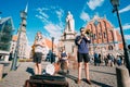 Riga Latvia Street Music Trio Band, Three Young Guys Playing Instruments For Donation