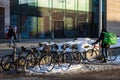 Bolt Food food delivery worker takes bicycle at bike parking