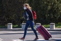 Passengers wearing face protective mask arrives at Riga International Airport