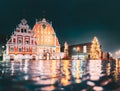 Riga, Latvia. Town Hall Square, Popular Place With Famous Landmarks On It In Night Illumination In Winter Twilight