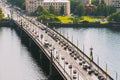 Riga, Latvia. Traffic On The Akmens Tilts, Stone Bridge, Street Royalty Free Stock Photo