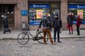 06-03-2020 Riga, Latvia Two smiling colleagues speaking and having fun at street