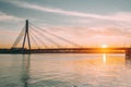 Riga, Latvia. Vansu Cable-Stayed Bridge Over The Daugava River, Western Dvina In Bright Sunset Or Sunrise Time Royalty Free Stock Photo