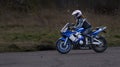 23-04-2020 Riga, Latvia. Woman riding a motorcycle on the road