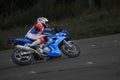 19-09-2021 Riga, Latvia A young man riding a motorcycle on an open road