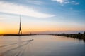 Riga old town panorama and TV tower. Sunset over the Daugava river Royalty Free Stock Photo