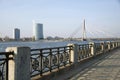 Riga. Quay of the river Dvina and a kind on the bridge. Royalty Free Stock Photo