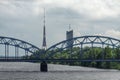 Riga Radio and TV Tower and a railway bridge