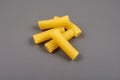 Rigatoni italian pasta on grey background Royalty Free Stock Photo