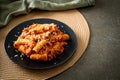 Rigatoni pasta bolognese with cheese