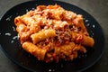 Rigatoni pasta bolognese with cheese