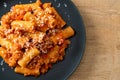 Rigatoni pasta bolognese with cheese