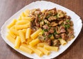 Rigatoni pasta with meat and mushroom sauce Royalty Free Stock Photo