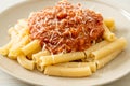 Rigatoni pasta with pork bolognese sauce Royalty Free Stock Photo