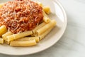 Rigatoni pasta with pork bolognese sauce Royalty Free Stock Photo
