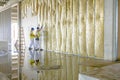 Riggers are working on thermal partition dry wall with mineral w Royalty Free Stock Photo