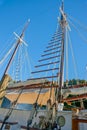 Old fashioned sailing boats moored alongside waterfront pier on Mahurangi River Royalty Free Stock Photo