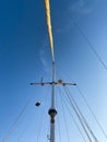 Rigging mast and ropes of a sailing boat under a blue sky Royalty Free Stock Photo