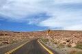 Right Curve and Speed Limit Traffic Signpost on the Empty Road in Atacama Desert, Los Flamencos National Reserve Royalty Free Stock Photo