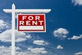 Right Facing For Rent Real Estate Sign Over Blue Sky and Clouds Royalty Free Stock Photo