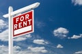 Right Facing For Rent Real Estate Sign Over Blue Sky and Clouds Royalty Free Stock Photo