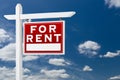 Right Facing For Rent Real Estate Sign Over Blue Sky and Clouds Royalty Free Stock Photo