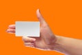 Right Female Hand Hold Blank White Card Mock-up. SIM Cellular Royalty Free Stock Photo