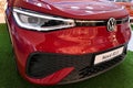 Right front view of modern red german battery electric compact crossover SUV car Volkswagen ID.5